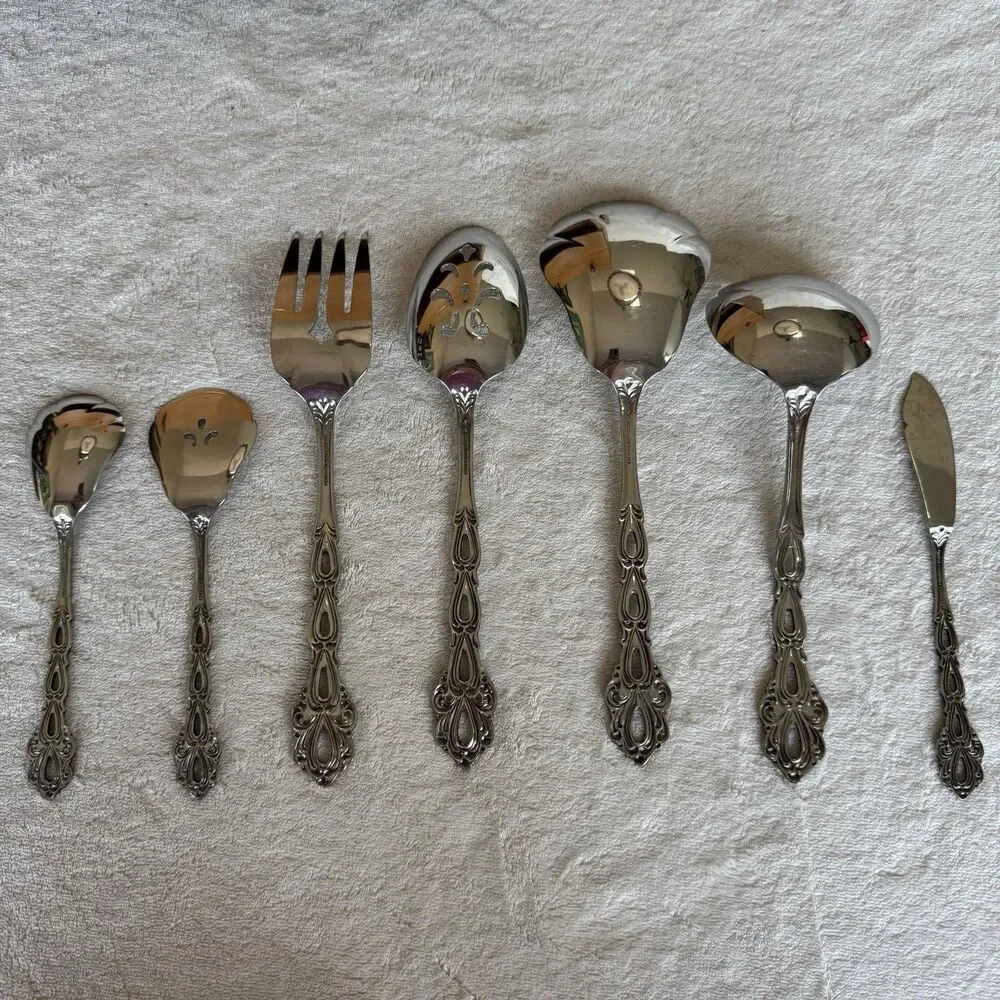 Vintage 7-piece Oneida Community Chandelier serving utensil set in stainless MCM